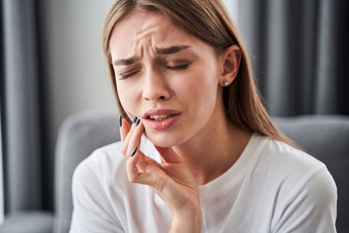 Woman experiencing a dental emergency in Incline Village, Nevada