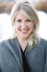 Smiling woman in winter coat outdoors